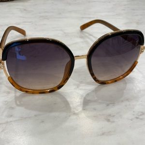 Jessica Simpson oversized sunglasses